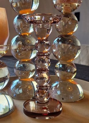 Kandelaar Opulent bruin kristalglas M op een luster met brandend waxinelichtje