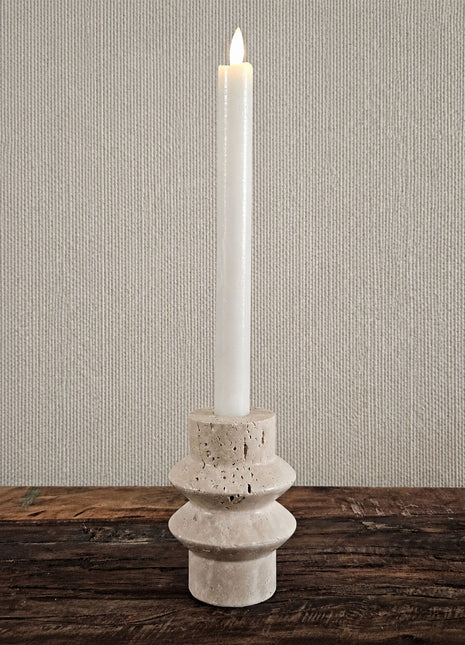 Kandelaar steen beige-grijs met een ronde schijfvorm op een witte ondergrond