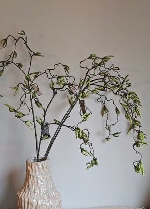Close-up van kunstplant salix wilgentak - natuurlijke uitstraling en realistische bladeren