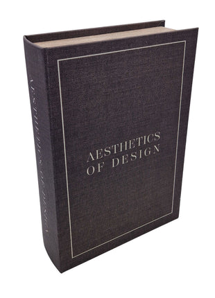Opbergboek Koffietafel Aesthetics of Design met  grijze stoffen kaft. De woorden Aesthetics of Design zijn er met witte letters op geschreven.