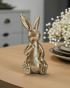 Ornament Chilandy goud in sfeervol interieur met warme styling