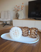 Decoratie Set Bubble Amber met waxinelichthouder Bubble in een complete interieurset met een bloem op een houten tafel