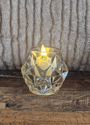 Waxinelichthouder lichtbruin glas in ronde gedrongen vorm op een witte ondergrond